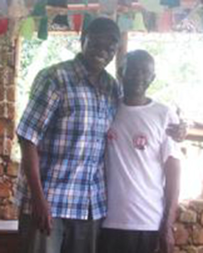 Pastor Sempja (right) of the village of Matugga.